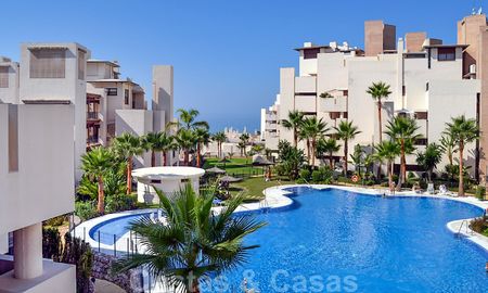Modern apartment for sale in a first line beach complex with sea view, between Marbella and Estepona 25736