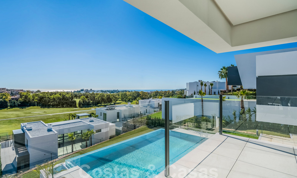 Ready to move in new luxury villa for sale, designed under a symmetrical architecture with modern lines, with golf and sea views in Marbella - Benahavis 36573
