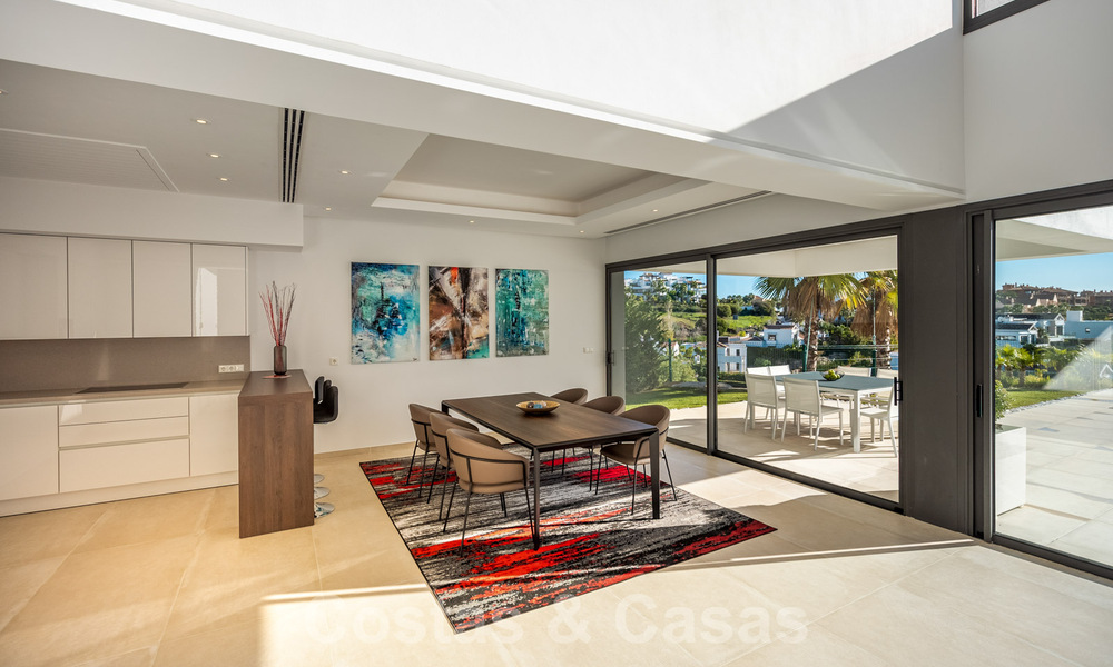Ready to move in new luxury villa for sale, designed under a symmetrical architecture with modern lines, with golf and sea views in Marbella - Benahavis 36579