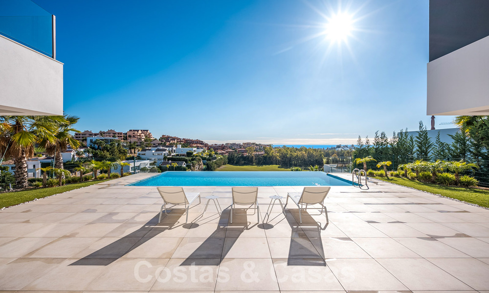 Ready to move in new luxury villa for sale, designed under a symmetrical architecture with modern lines, with golf and sea views in Marbella - Benahavis 36589