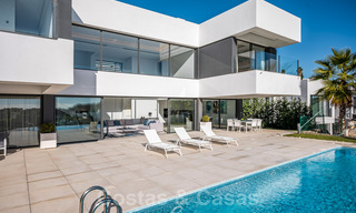 Ready to move in new luxury villa for sale, designed under a symmetrical architecture with modern lines, with golf and sea views in Marbella - Benahavis 36590 