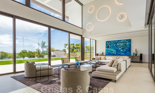 Ready to move in new, modern spacious luxury villa for sale, located directly on the golf course in Marbella - Benahavis 25912 