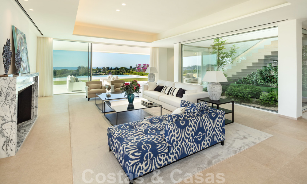 First line golf villa in elegant modern style with panoramic golf and sea views for sale in Los Flamingos Golf in Marbella - Benahavis 26113