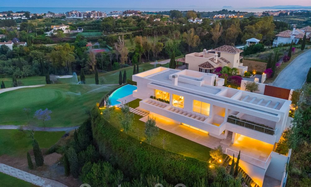 First line golf villa in elegant modern style with panoramic golf and sea views for sale in Los Flamingos Golf in Marbella - Benahavis 26124