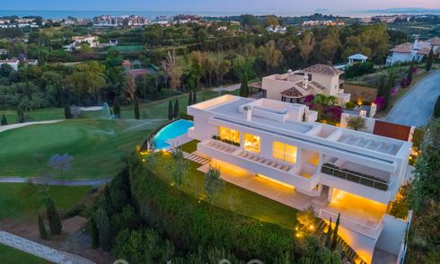 First line golf villa in elegant modern style with panoramic golf and sea views for sale in Los Flamingos Golf in Marbella - Benahavis 26124
