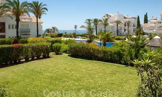 Spacious garden apartment for sale with sea views in a beautiful complex directly on the beach in Los Monteros, Marbella 26130 