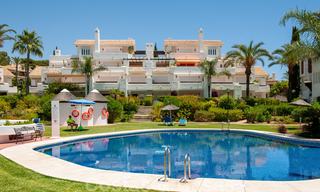 Spacious garden apartment for sale with sea views in a beautiful complex directly on the beach in Los Monteros, Marbella 26133 