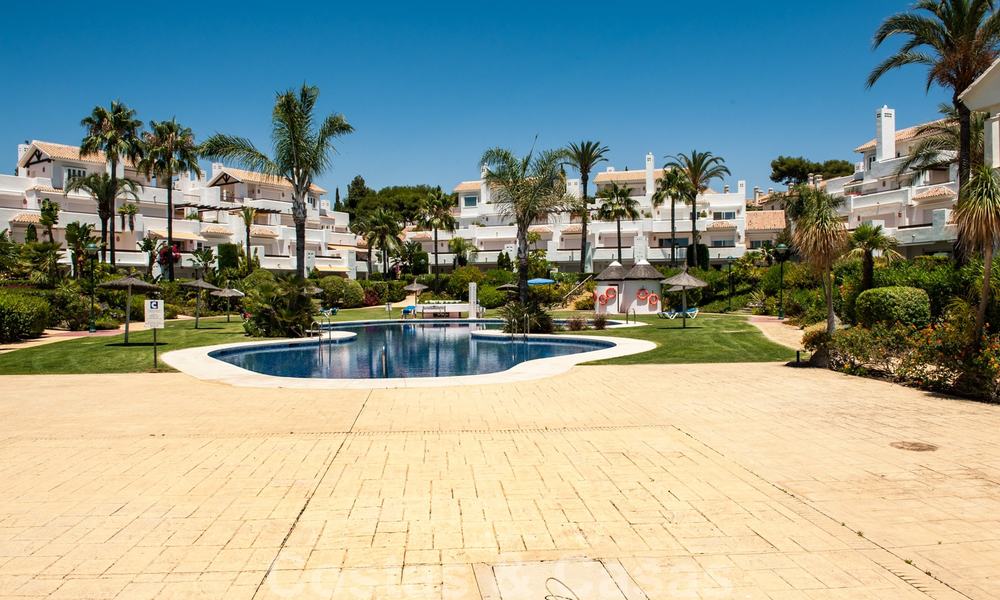 Spacious garden apartment for sale with sea views in a beautiful complex directly on the beach in Los Monteros, Marbella 26134
