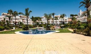 Spacious garden apartment for sale with sea views in a beautiful complex directly on the beach in Los Monteros, Marbella 26134 