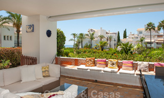 Spacious garden apartment for sale with sea views in a beautiful complex directly on the beach in Los Monteros, Marbella 26138 