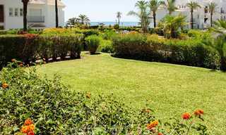 Spacious garden apartment for sale with sea views in a beautiful complex directly on the beach in Los Monteros, Marbella 26146 
