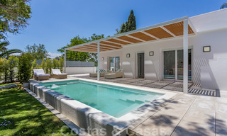 First line golf and a stone's throw from the beach located designer villa for sale in the chic Guadalmina Baja in Marbella 26314 