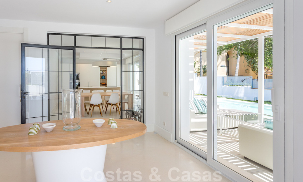 First line golf and a stone's throw from the beach located designer villa for sale in the chic Guadalmina Baja in Marbella 26324