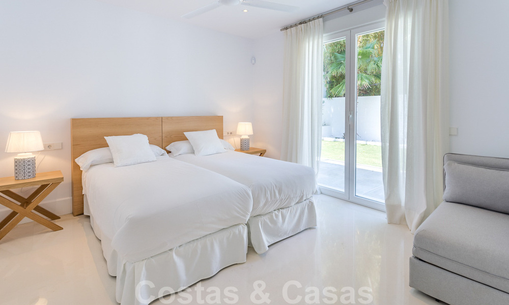 First line golf and a stone's throw from the beach located designer villa for sale in the chic Guadalmina Baja in Marbella 26335