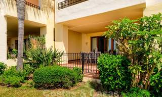 Luxury apartment for sale with open garden and sea views in a first line beach complex, on the New Golden Mile between Marbella and Estepona 26838 