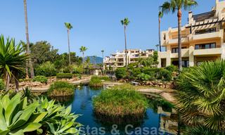 Luxury apartment for sale with open garden and sea views in a first line beach complex, on the New Golden Mile between Marbella and Estepona 26840 