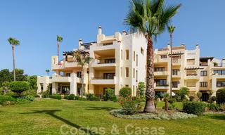 Luxury apartment for sale with open garden and sea views in a first line beach complex, on the New Golden Mile between Marbella and Estepona 26841 