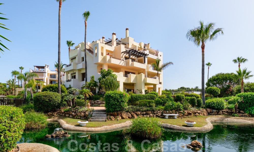Luxury apartment for sale with open garden and sea views in a first line beach complex, on the New Golden Mile between Marbella and Estepona 26845