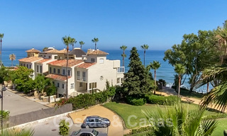 Modern apartment for sale on the first row of a beachfront complex with open sea views located between Marbella and Estepona 26999 