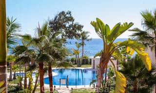 Modern apartment for sale on the first row of a beachfront complex with open sea views located between Marbella and Estepona 27015 
