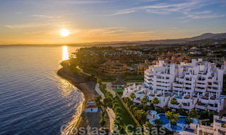 Modern apartment for sale on the first row of a beachfront complex with open sea views located between Marbella and Estepona 27017 