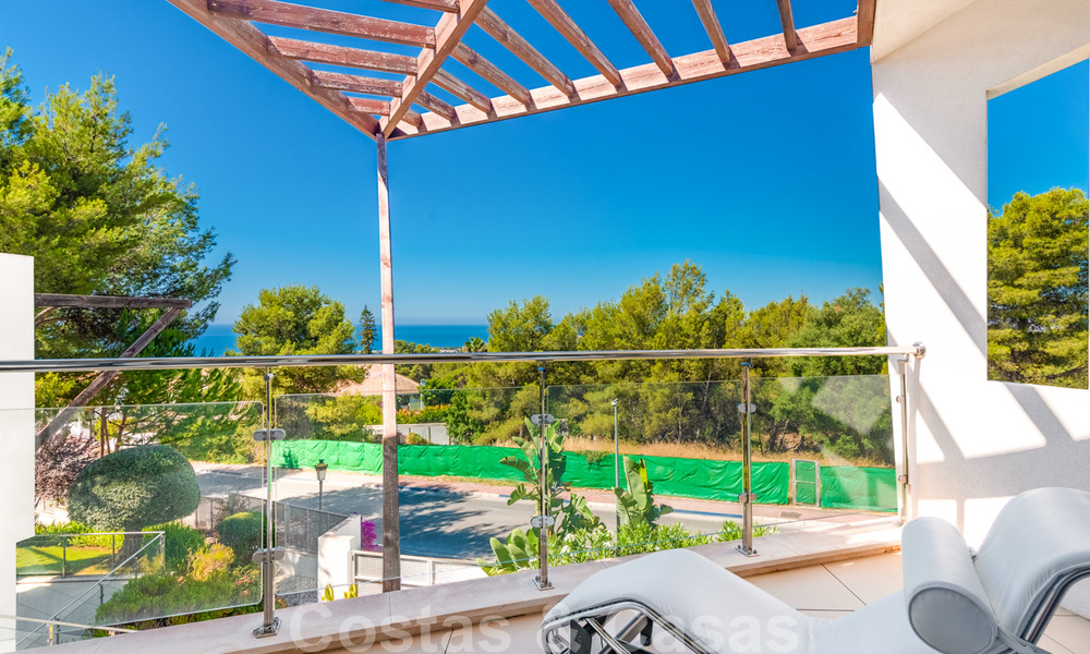 Modern luxury corner house with sea view for sale in the exclusive Sierra Blanca, Marbella 27137