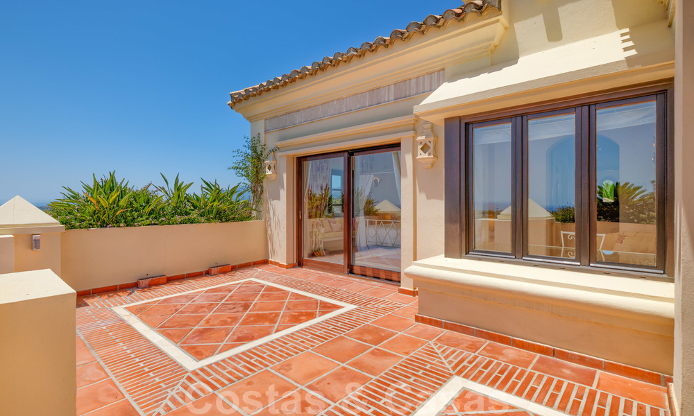 Traditional classic Mediterranean luxury villa for sale with stunning sea views in a gated community on the Golden Mile, Marbella 27300