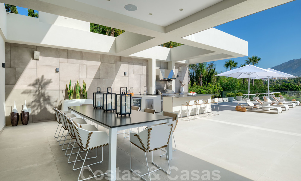 Exclusive new modern villa for sale, directly on the Las Brisas golf course in the Golf Valley of Nueva Andalucia, Marbella 27431