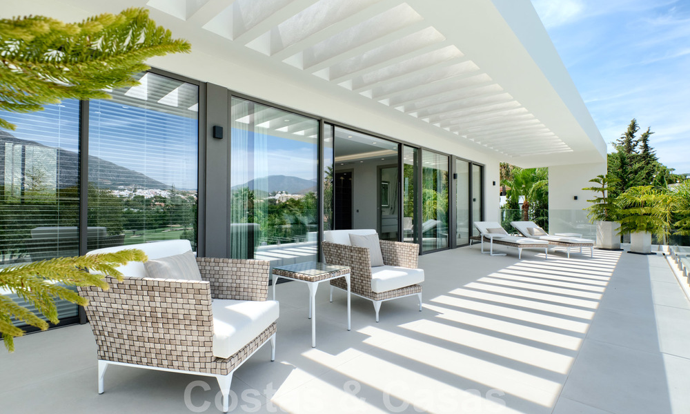Exclusive new modern villa for sale, directly on the Las Brisas golf course in the Golf Valley of Nueva Andalucia, Marbella 27471