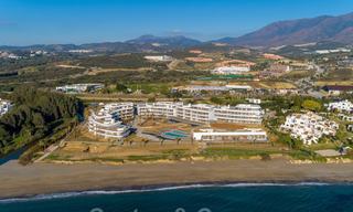 Spectacular modern luxury beachfront penthouses for sale in Estepona, Costa del Sol. Ready to move in. Promotion! 27801 