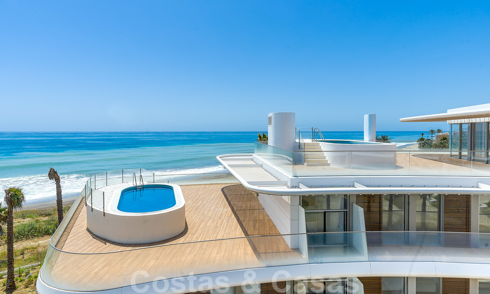 Spectacular modern luxury beachfront penthouses for sale in Estepona, Costa del Sol. Ready to move in. Promotion! 27811