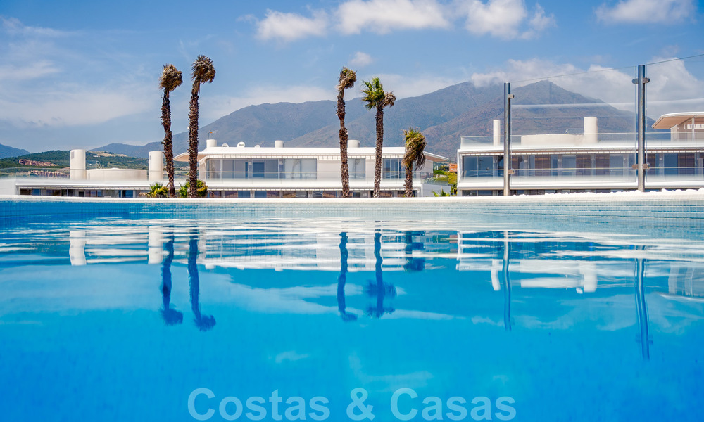 Spectacular modern luxury frontline beach apartments for sale in Estepona, Costa del Sol. Ready to move in. 27836