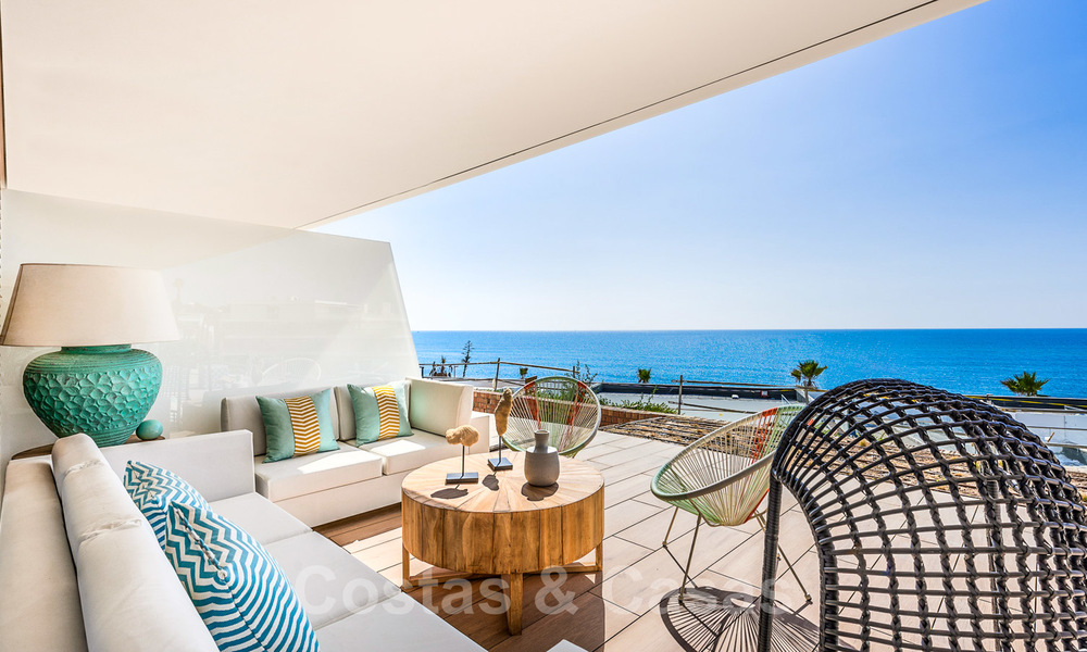 Spectacular modern luxury frontline beach apartments for sale in Estepona, Costa del Sol. Ready to move in. 27837
