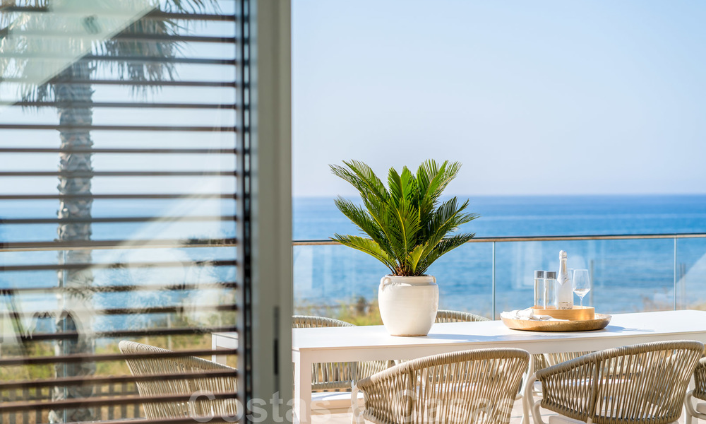 Ready to move in modern luxury front line beach villa for sale in an exclusive complex in Estepona, Costa del Sol 28205