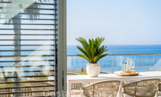 Ready to move in modern luxury front line beach villa for sale in an exclusive complex in Estepona, Costa del Sol 28205 