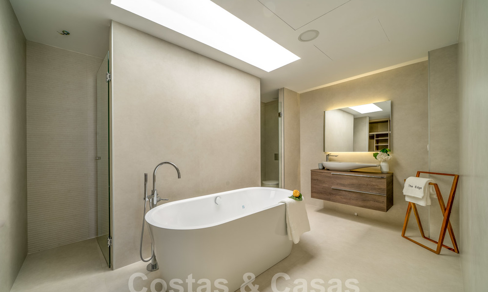 Ready to move in modern luxury front line beach villa for sale in an exclusive complex in Estepona, Costa del Sol 28206
