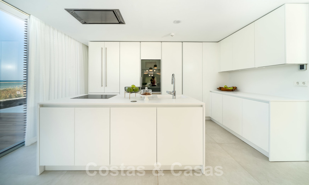 Ready to move in modern luxury front line beach villa for sale in an exclusive complex in Estepona, Costa del Sol 28209