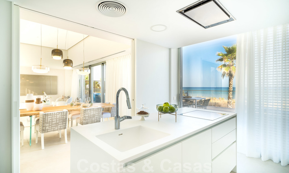 Ready to move in modern luxury front line beach villa for sale in an exclusive complex in Estepona, Costa del Sol 28211