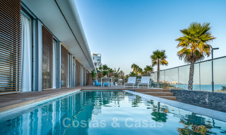 Ready to move in modern luxury front line beach villa for sale in an exclusive complex in Estepona, Costa del Sol 28216 