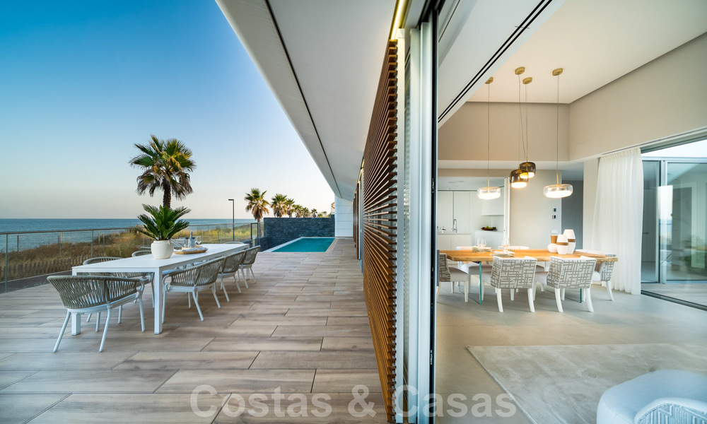 Ready to move in modern luxury front line beach villa for sale in an exclusive complex in Estepona, Costa del Sol 28217