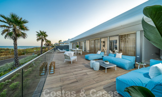 Ready to move in modern luxury front line beach villa for sale in an exclusive complex in Estepona, Costa del Sol 28218 