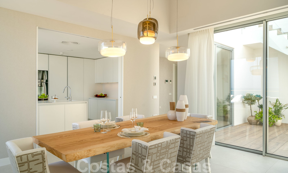 Ready to move in modern luxury front line beach villa for sale in an exclusive complex in Estepona, Costa del Sol 28221