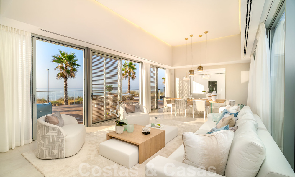Ready to move in modern luxury front line beach villa for sale in an exclusive complex in Estepona, Costa del Sol 28223