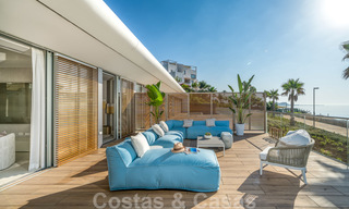 Ready to move in modern luxury front line beach villa for sale in an exclusive complex in Estepona, Costa del Sol 28226 