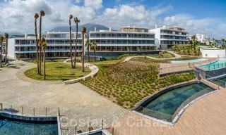 Ready to move in modern luxury front line beach villa for sale in an exclusive complex in Estepona, Costa del Sol 28228 
