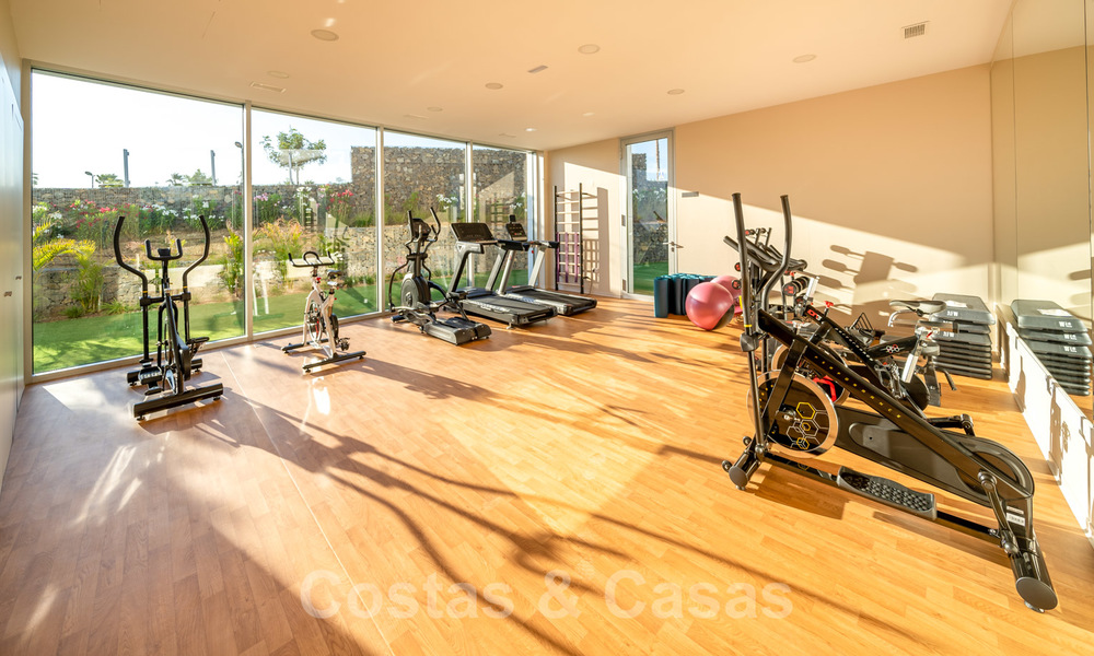 Ready to move in modern luxury front line beach villa for sale in an exclusive complex in Estepona, Costa del Sol 28236