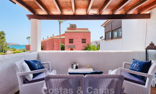 Redecorated townhouse for sale in a small frontline beach complex in Estepona West, close to the city 28115 