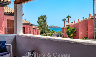 Redecorated townhouse for sale in a small frontline beach complex in Estepona West, close to the city 28116 