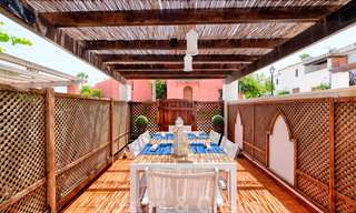 Redecorated townhouse for sale in a small frontline beach complex in Estepona West, close to the city 28118 