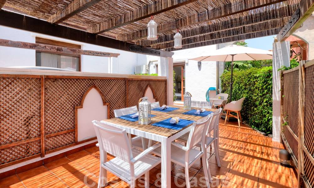 Redecorated townhouse for sale in a small frontline beach complex in Estepona West, close to the city 28119